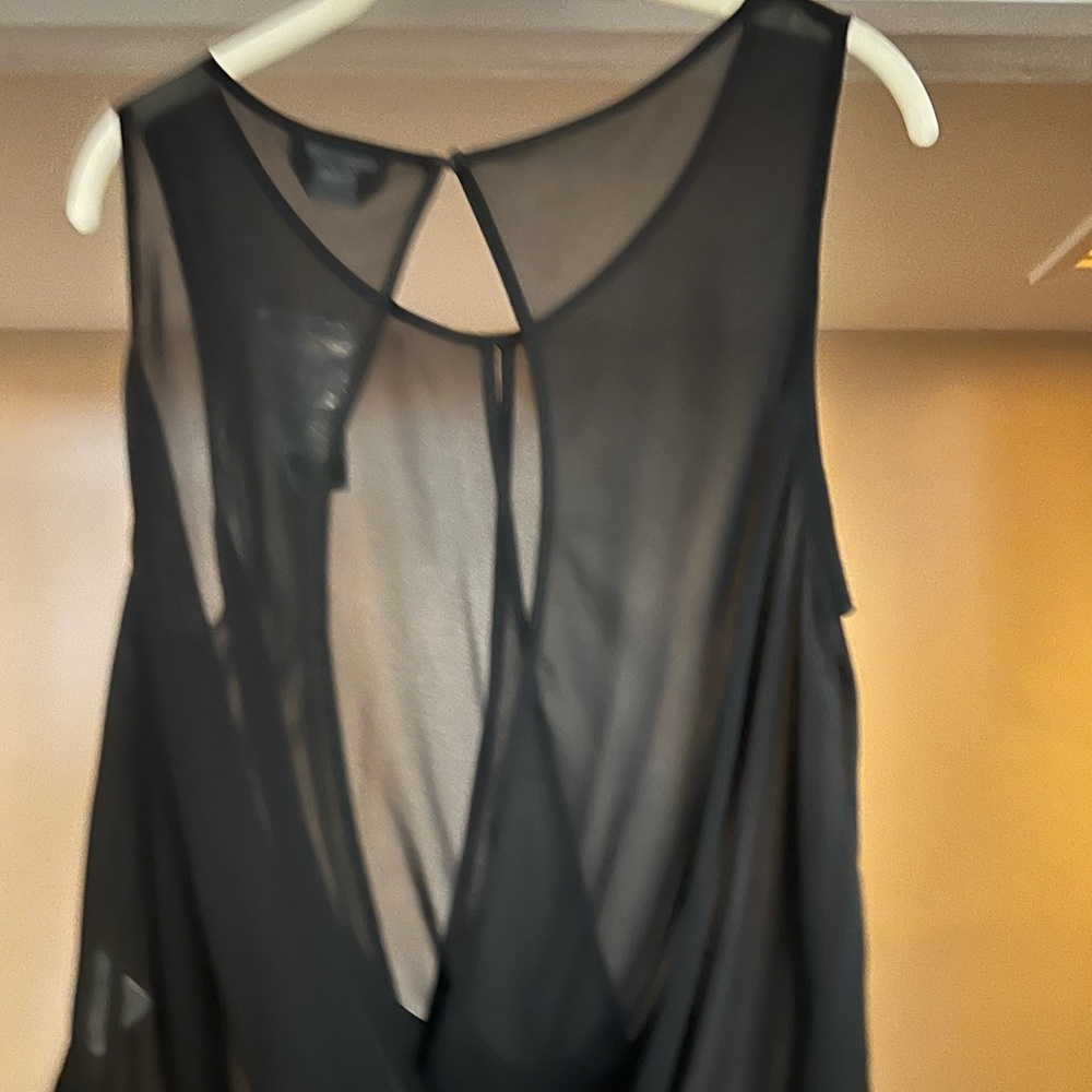 Bebe sheer black open back top size L
